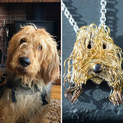 Captain - a silver and 22ct gold Otterhound