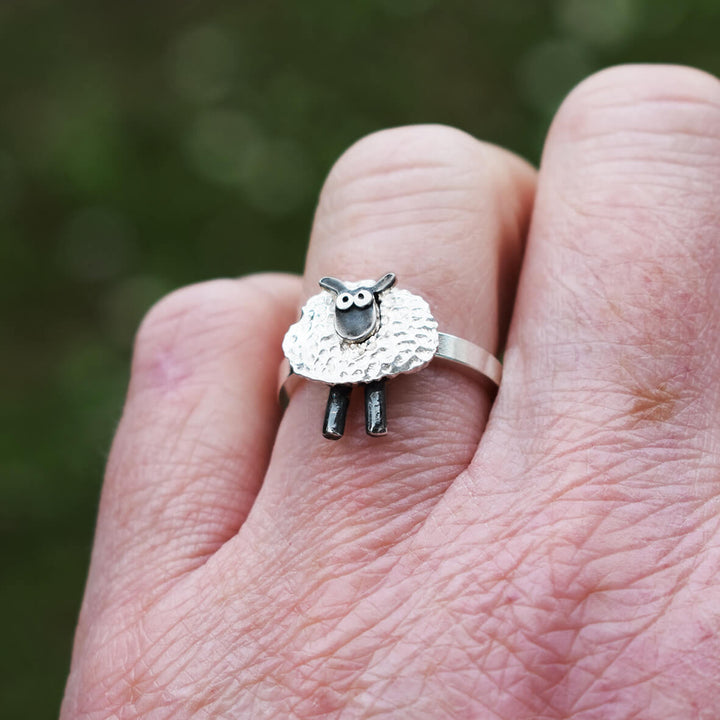 silver sheep ring on finger, shaun the sheep style silver ring, silver sheep jewellery