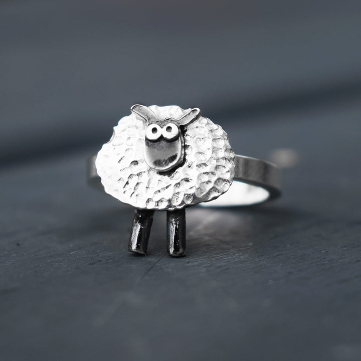 silver sheep ring on finger, shaun the sheep style silver ring, silver sheep jewellery