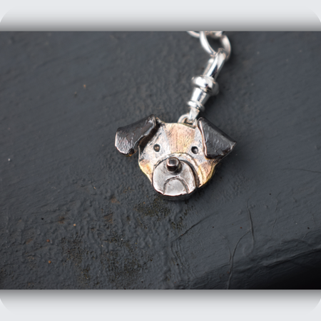 charm bracelet of a pug dog i made from customer photos in silver and gold